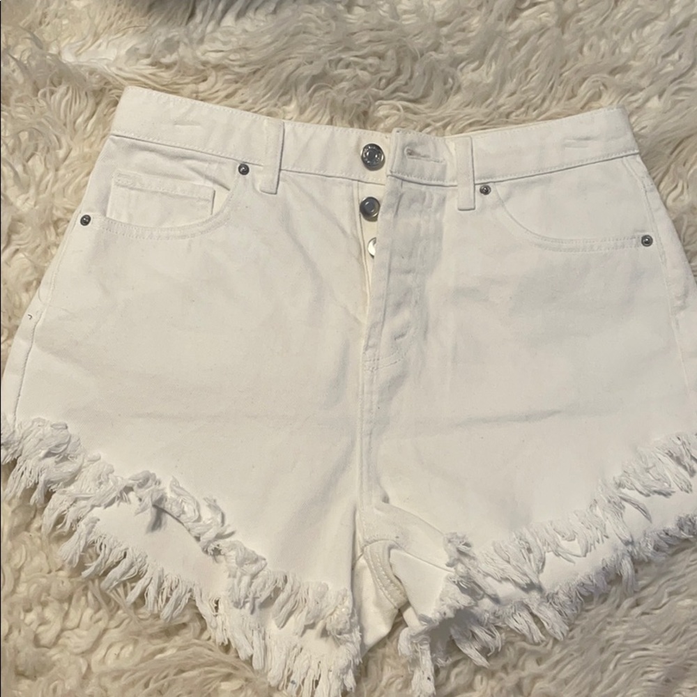 White frayed Jean shorts.